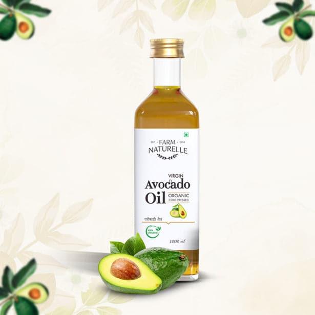 Bottle of cold-pressed extra virgin avocado oil with fresh avocados – rich in nutrients, antioxidants, and healthy fats.
